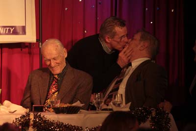 Larry Fuller kisses Ken Urmston